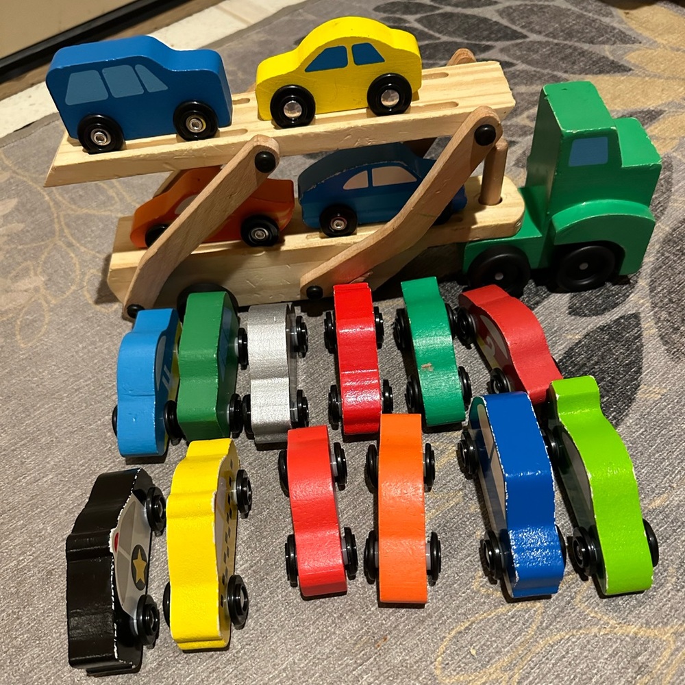 Melissa and Doug car hauler and extra cars